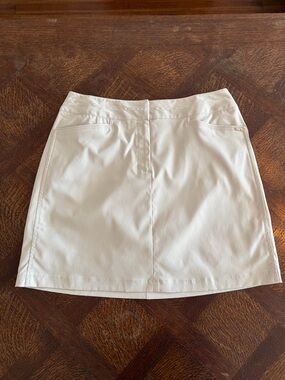 TAIL Cream Mini Skirt with Front Seam and Pocket Detail